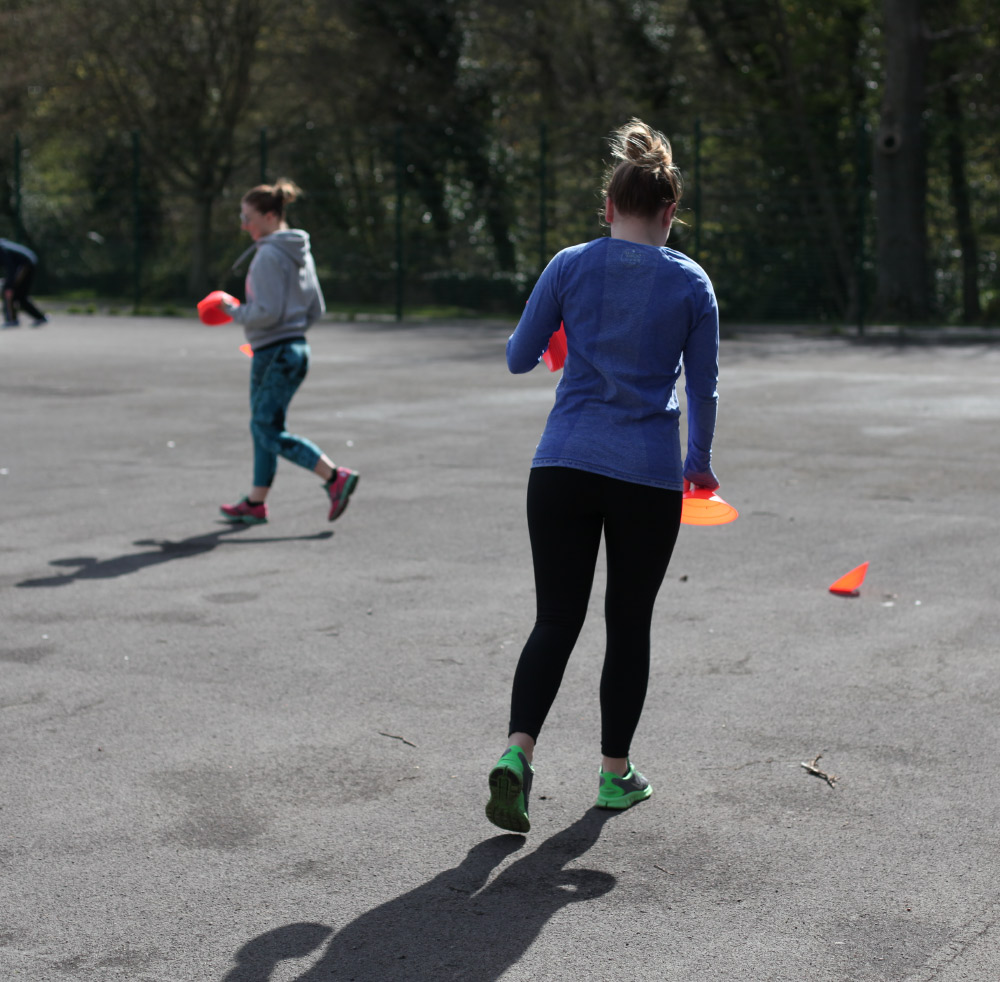 A client running with cones